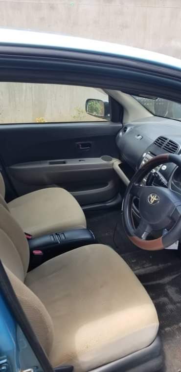 A picture of TOYOTA VITZ _1000CC UGX 13.5M Such a baby blue But