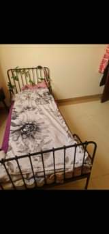 A picture of Ikea extendable kids metal bed