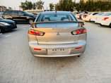 A picture of 0563289778 Mitsubishi Lancer mid option for sale bank auto loan
