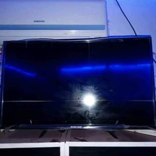 A picture of TV Ac Generator flat screen and a printer