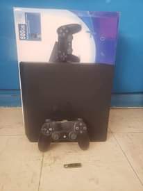 A picture of Unbox slim playstation 4 1 terabyte terhacked with at least