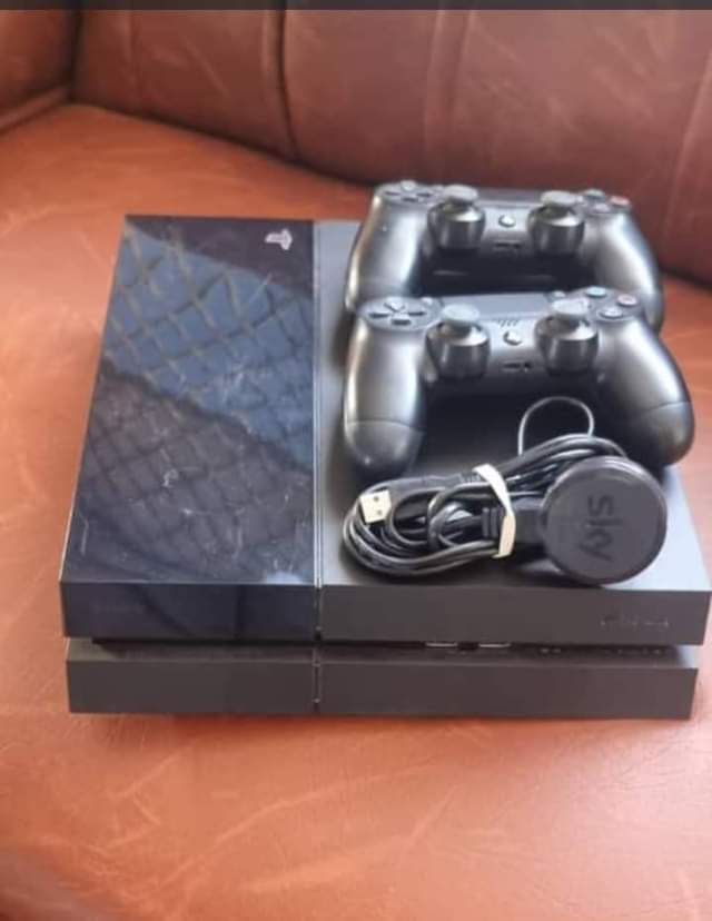 A picture of PlayStation 4 with remote controller Hardly used in good condition