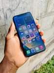 A picture of iPhone X 256Gb at 590k contact 0707223391