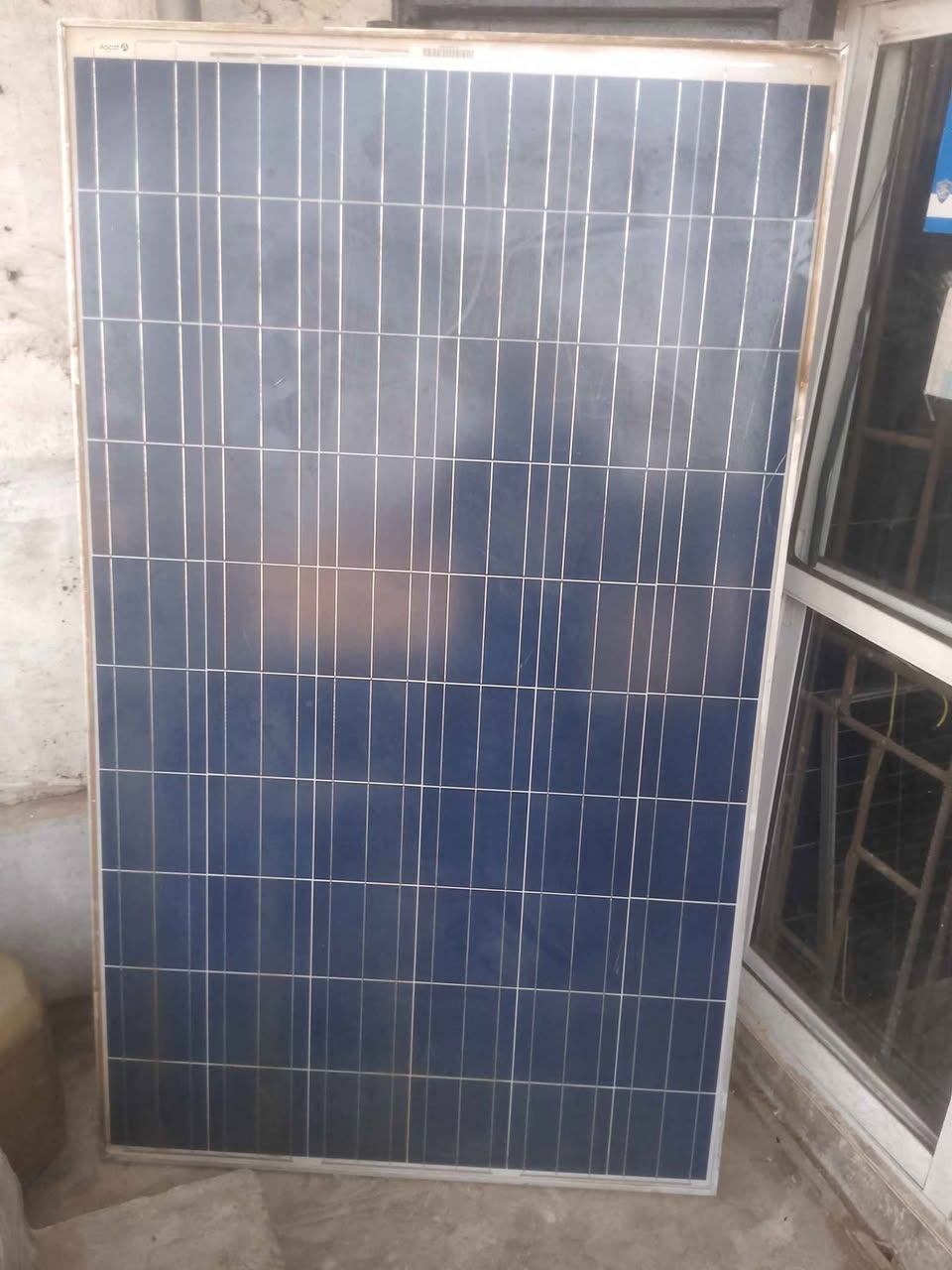 A picture of 3 5kva 24v inverter with 2 fairly tubular Batteries and
