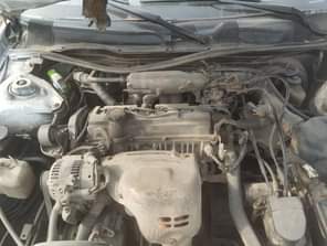 A picture of Camry tiny light Untouched engine Body ok Ac needs attention