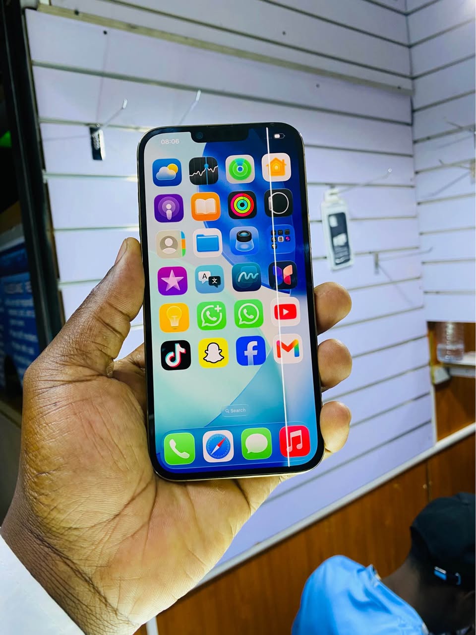 A picture of iPhone 13pro max with a line as seen 512gb no