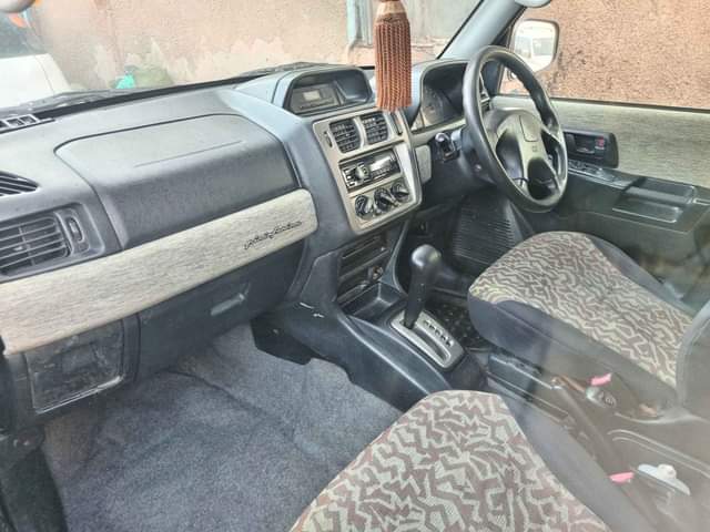A picture of Pajero io CALL 0 7 5 9 6 5 4