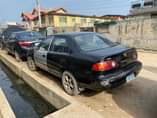 A picture of Toyota corolla 2001 buy and drive engine and gear working