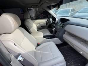 A picture of Brand Honda Model Pilot Year 2011 A C cooling Price