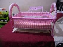 A picture of Baby s metallic crib and mattress