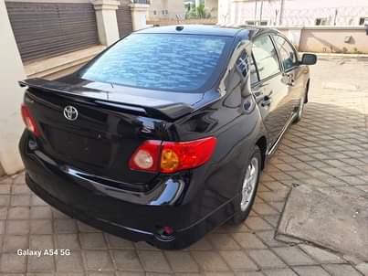 A picture of 09 Corolla super sharp with untampered engine and gear chilling