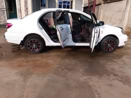 A picture of 04 TOYOTA COROLLA EVERYTHING WORKING WELL PRICE 4M SETTLEMENT 100K