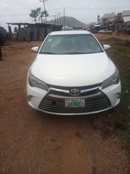 A picture of Distress Distress Distress Toyota Camry 2016 untermperd and gear AC