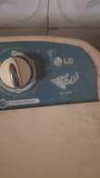 A picture of LG washing machine and Honda 3kva generator