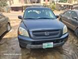 A picture of Nigerian Used 2004 Honda Pilot with AC Sound Gear Engine