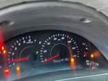 A picture of This is Camry 2010 model partly painted 4 plugs venza