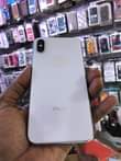 A picture of iPhone X 256gb storage Working Face ID 100 battery health