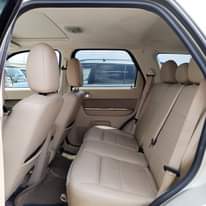 A picture of AVAILABLE NOW FORD ESCAPE 2010 MODEL FOREIGN USED MILK INTERIOR