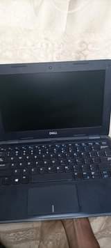 A picture of Dell latitude N4100 portable size at 450 000