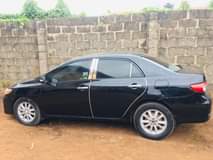 A picture of Neatly painted on first body Corolla 012 buy and drive