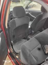 A picture of Serious Buyer Only Toyota Corolla 2004 Engine is tapping a