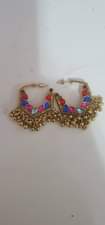 A picture of Jhumka and cosmetic