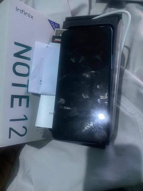 A picture of Infinix note 12 for sale one week used 55k 09061358848