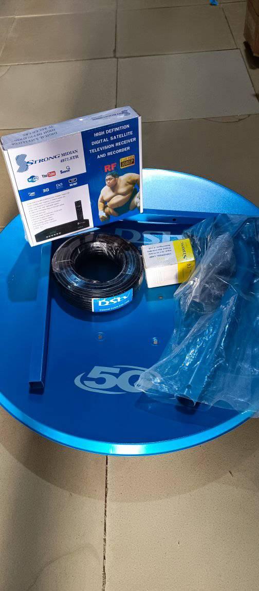 A picture of STRONG DECODER DISH AND CABLE