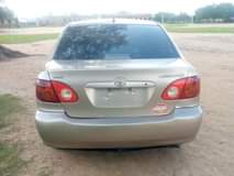 A picture of Toks standard Corolla 2004 Engine and gear AC chill like