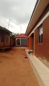 A picture of 2bedrooms sitting room and store for sale at bujuuko biira