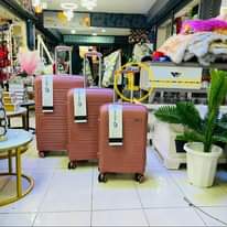A picture of RUBBER SUITCASES