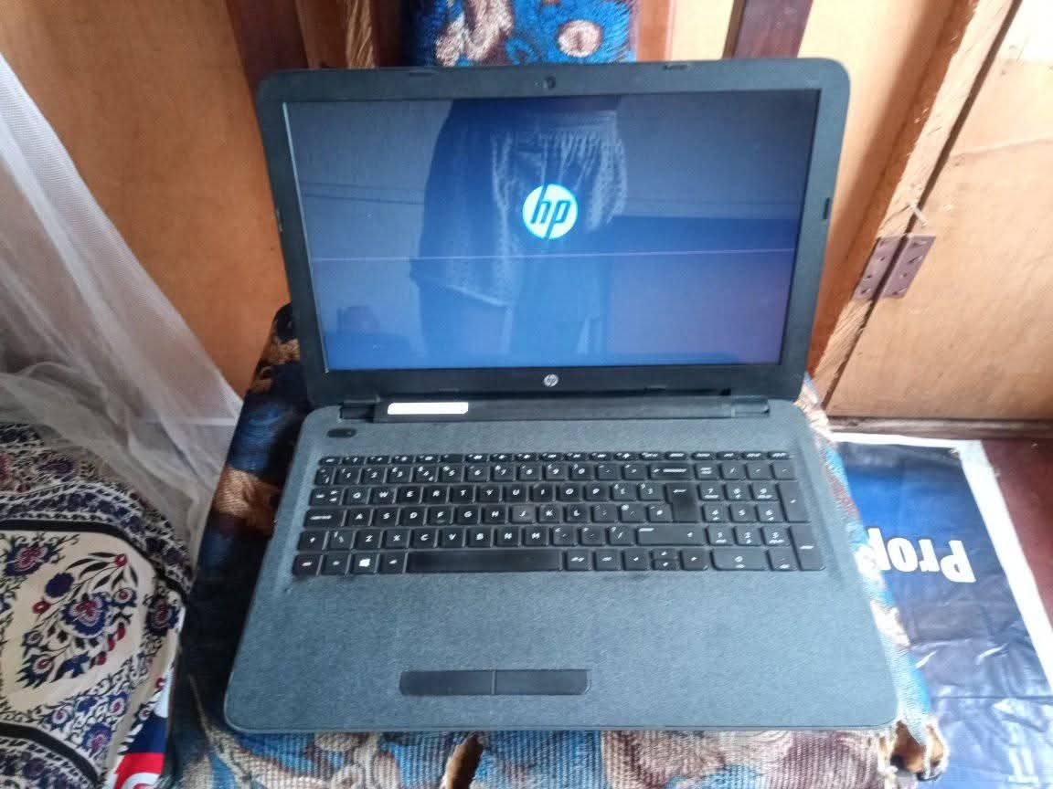 A picture of Grade one fairly used HP Slim Laptop