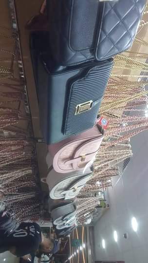 A picture of Bags clutches and back pack