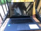 A picture of SYSTEM i3 vivobook MacBook 8gb ram. Finger print and screentouch