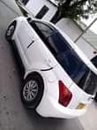 A picture of Toyota Ist DK white Kali sana