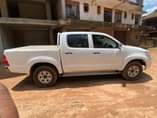A picture of Hilux Vigo and TVS Star on sale location Luzira kirombe