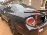 A picture of 2003 Nissian Maxima with sound V6 engine