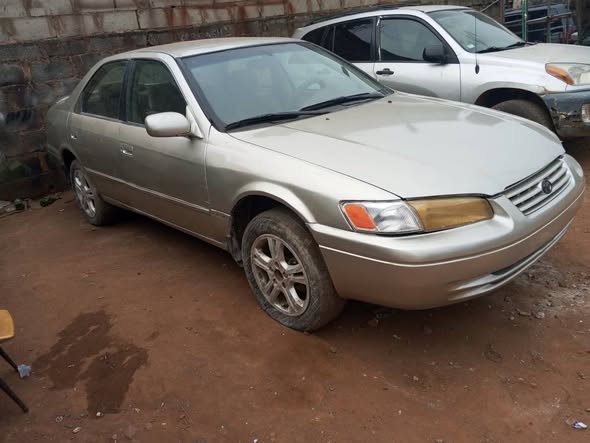 A picture of AWOOF GIVEAWAY Registered Toyota Camry Tiny light with tapping engine