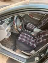 A picture of Toyota Corolla 03 04 Engine gear ac Painted After U