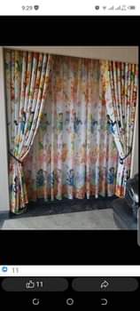 A picture of Curtains and rod s