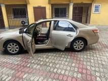 A picture of Sharp first body 2008 Toyota Camry sound four plugs engine