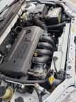 A picture of A foreign used white Corolla Sports very very clean and