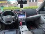 A picture of This is Camry 2010 model partly painted 4 plugs venza