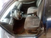 A picture of PARTIALLY FIRST BODY NIGERIA USED TOYOTA COROLLA 2005 Engine dey