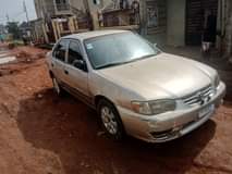 A picture of PARTIALLY FIRST BODY NIGERIA USED TOYOTA COROLLA Good engine and