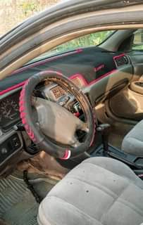 A picture of Toyota Camry tiny light with good engine gear and AC