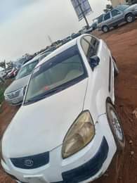 A picture of low budget car 2008 model Kia Rio manual transmission going