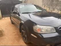 A picture of 2003 Nissian Maxima with sound V6 engine