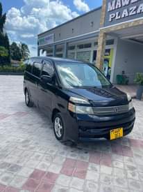 A picture of TOYOTA NOAH NEW SHAPE BEI M5 5