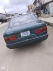 A picture of Small cars for taxi business Nissan for 500k Engine gear